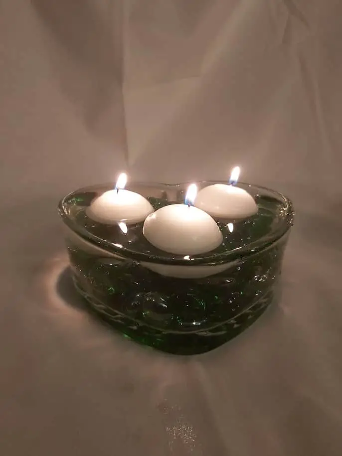 DIY floating candle made for less than $4 from Dollar Tree supplies. #diy #homedecor #floatingcandle #candle