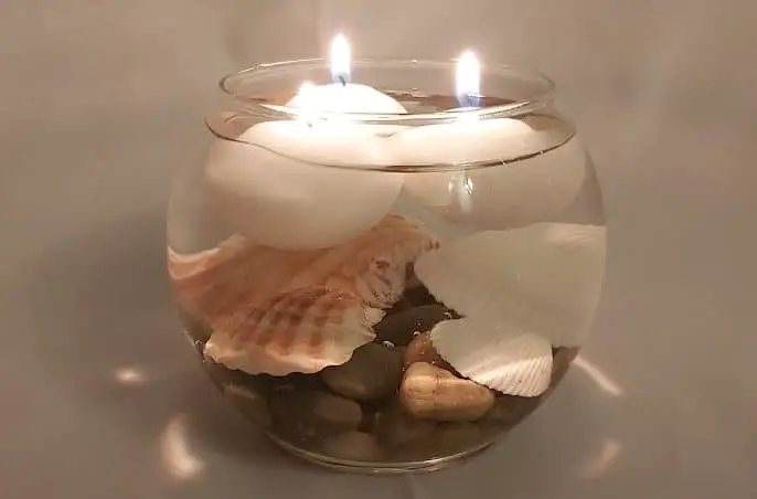DIY floating candle made for less than $5 from Dollar Tree supplies. #diy #homedecor #floatingcandle #candle
