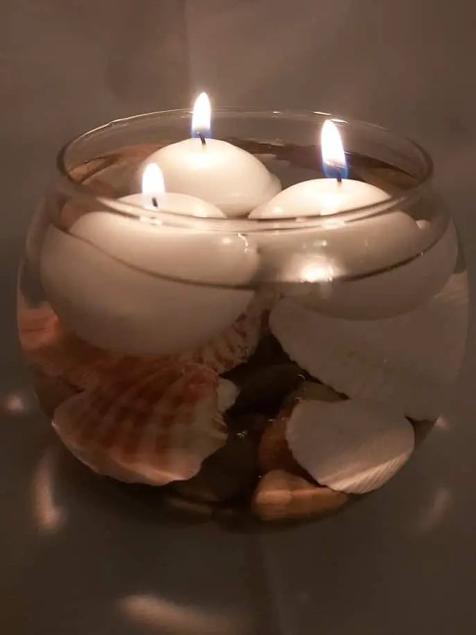 DIY floating candle made for less than $5 from Dollar Tree supplies. #diy #homedecor #floatingcandle #candle