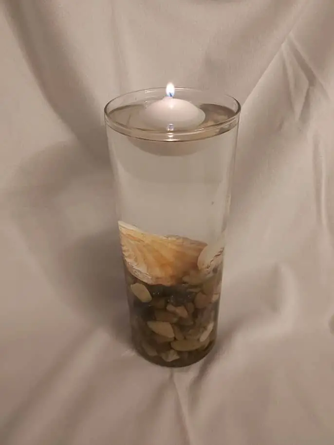DIY floating candle made for less than $4 from Dollar Tree supplies. #diy #homedecor #floatingcandle #candle